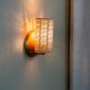 Handcrafted Costa Wall Lamp Mini Rattan Brass with natural rattan cylindrical shade.