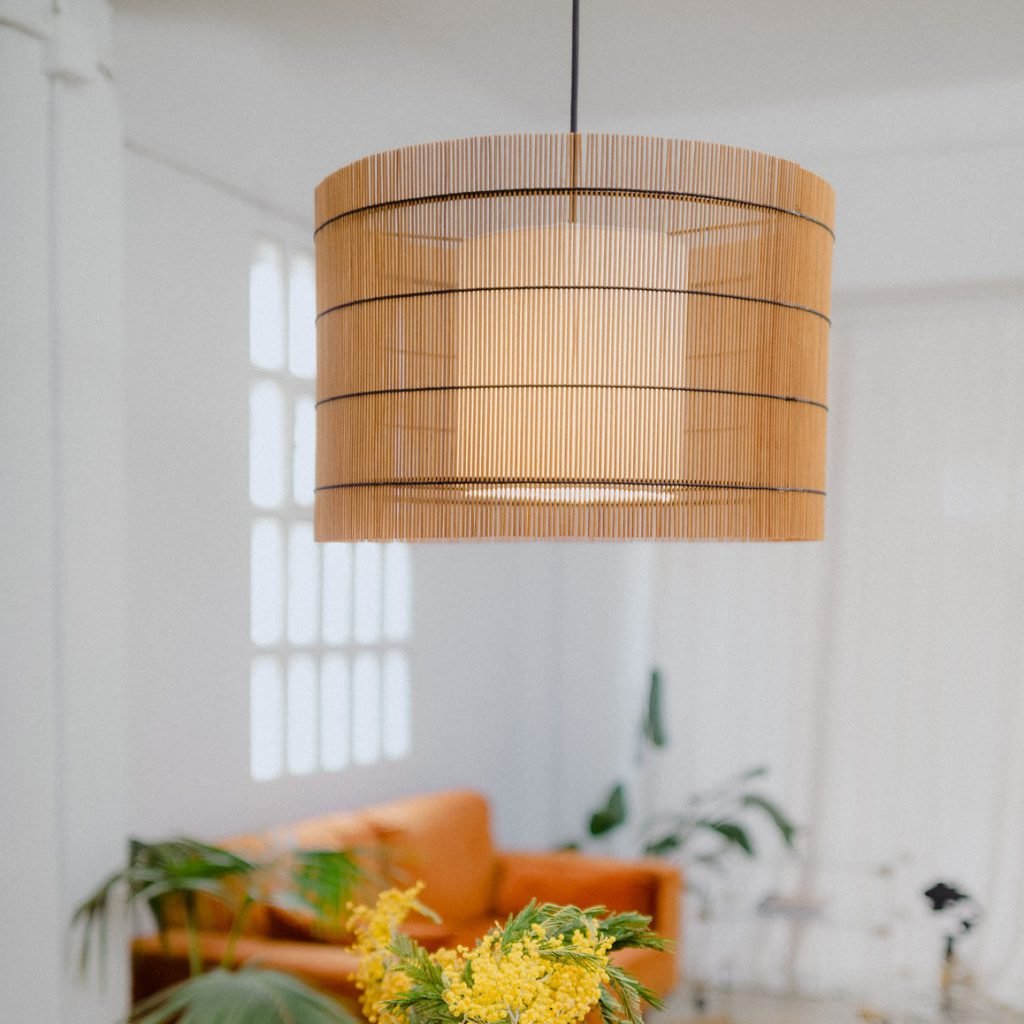 Handmade FOC Suspended Lamp XL in cherry bamboo with black thread, featuring a white inner shade for ambient lighting.