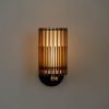 Handcrafted SUA Wall Sconce Lamp S with MDF wood slats and brass, featuring dual shades for warm light.